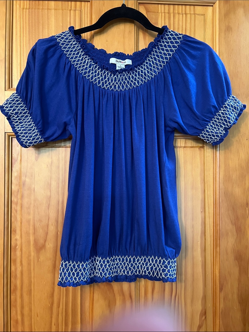peasant top with white smocking at neckline, sleeves, & hem, royal blue